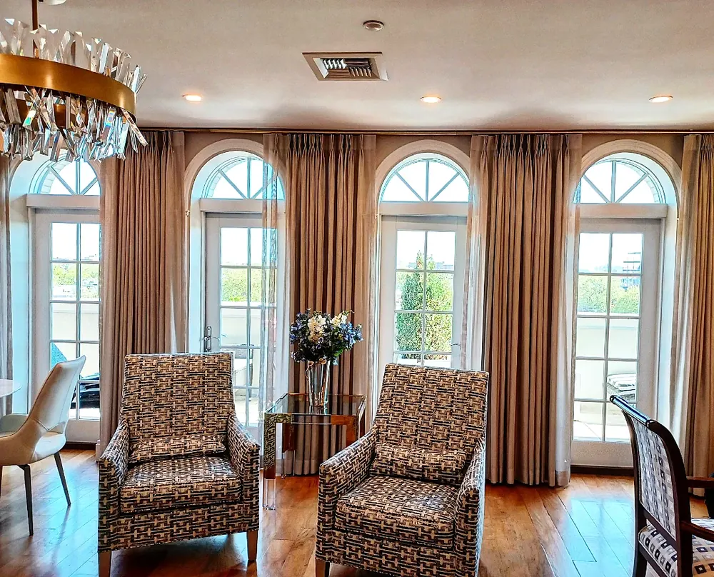 Drapery on arched French doors