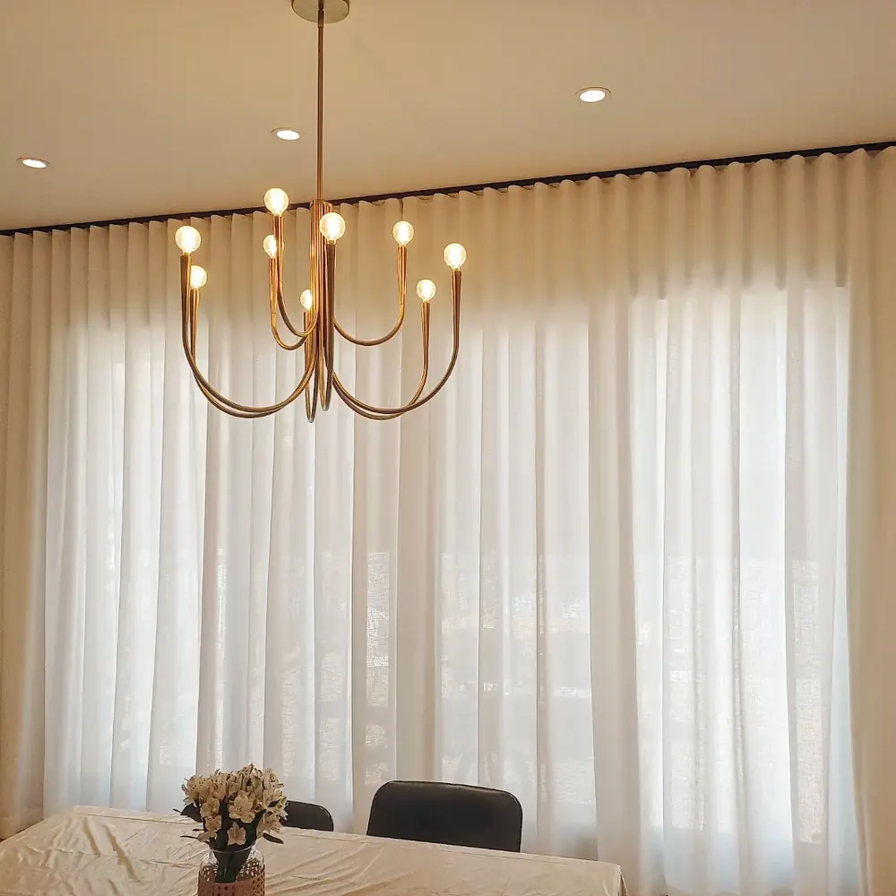 Floor-to-ceiling sheer drapery, dining room