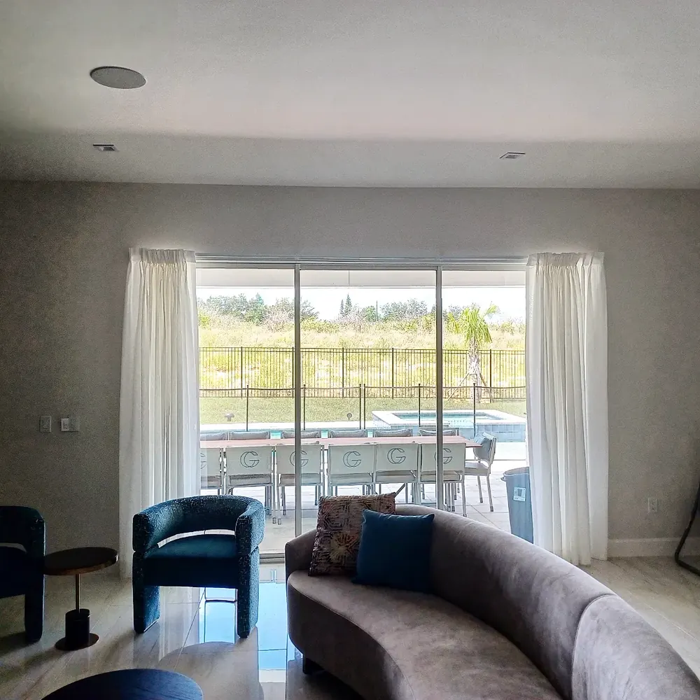 Sheer drapery, sliding glass doors